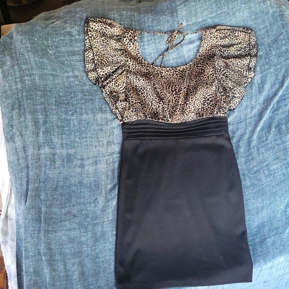 Animal print and black dress